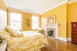 Living room design with yellow wallpaper