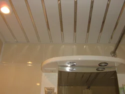 Bathroom interior with slatted ceiling
