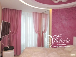 Interior of curtains in the bedroom with pink wallpaper