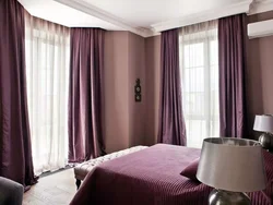 Interior of curtains in the bedroom with pink wallpaper