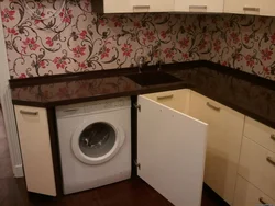 Кір жуғыш машинаның фотосуреті болса, ас үйдің шағын дизайны