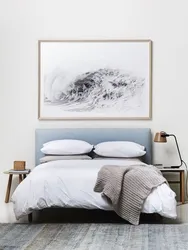 Paintings in the bedroom above the bed photo in photo design