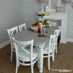Round wooden table in the kitchen interior