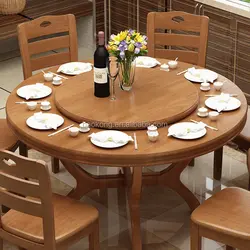 Round wooden table in the kitchen interior