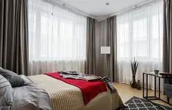 Bedroom with corner window photo