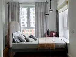 Bedroom with corner window photo