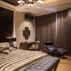 Bedroom interior design with dark furniture