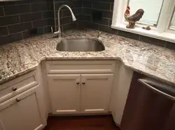 Corner sink in the kitchen in the interior