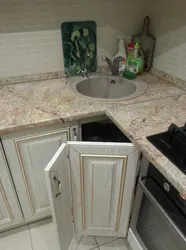 Corner sink in the kitchen in the interior