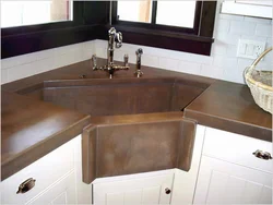 Corner sink in the kitchen in the interior