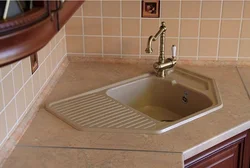 Corner sink in the kitchen in the interior