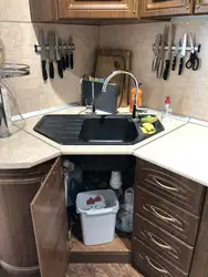 Corner sink in the kitchen in the interior