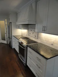 Light Kitchen With Gray Countertop Photo