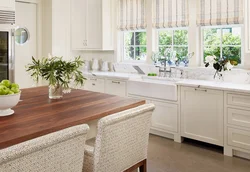 Kitchen living room with sink by the window in the house photo