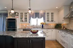 Kitchen living room with sink by the window in the house photo