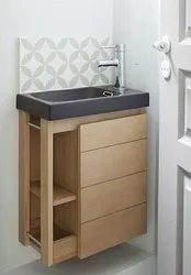 Bathroom sink design with cabinet