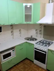 Furnishings of small kitchens photo in Khrushchev with a refrigerator