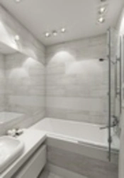Gray white tiles in the bathroom interior