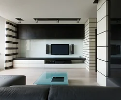 Photo of a living room with a TV on the wall