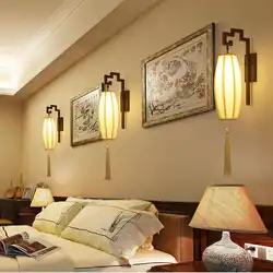 Sconce lamp on the wall in the bedroom photo