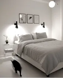 Sconce lamp on the wall in the bedroom photo