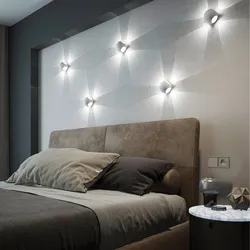 Sconce lamp on the wall in the bedroom photo