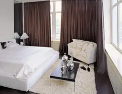 Bedroom design with dark curtains