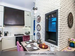 Kitchen with brick wallpaper design photo