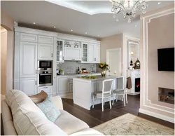 Modern living room interior with white kitchen