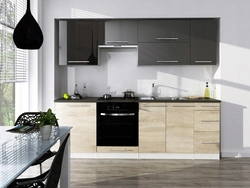 Photo of a kitchen with a black panel