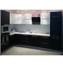 Photo of a kitchen with a black panel