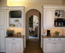 TV above the refrigerator in the kitchen photo