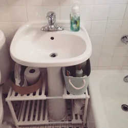 Photo Of A Bathtub With A Tulip Sink