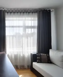 Curtains with eyelets in the bedroom interior photo