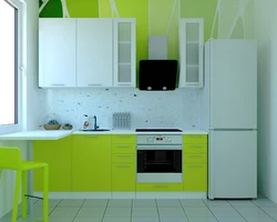 Зеленый холодильник на кухне фото