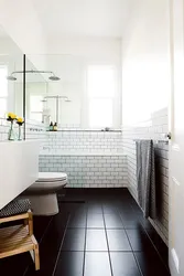 Bathroom design with dark floor