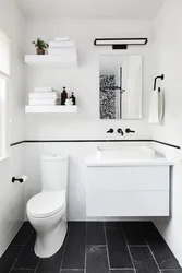 Bathroom design with dark floor