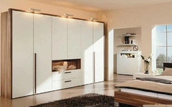 Section of wardrobes in the bedroom photo