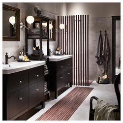Black bathtub faucets in the interior photo