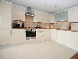 Cream-colored kitchen in the interior