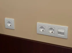 Sockets above the bedside table in the bedroom photo