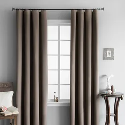 Blackout curtains in the bedroom interior photo