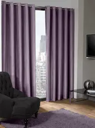 Blackout curtains in the bedroom interior photo