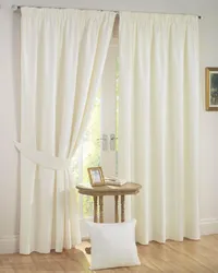 Blackout curtains in the bedroom interior photo