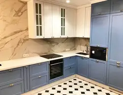 Photo of a blue and beige kitchen