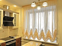 French curtains in the kitchen interior