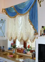 French curtains in the kitchen interior