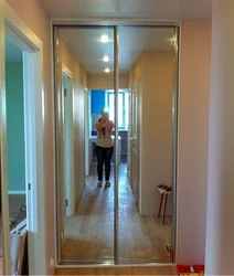 Wardrobe In The Hallway With A Mirror Photo