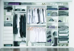 Interior filling of a wardrobe in a bedroom photo