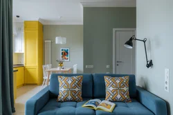 Blue sofa in the kitchen interior photo